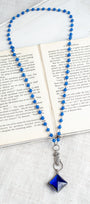 Cobalt Blue Soldered Crystal Pendant with Vintage Hand Drop on Cobalt Blue Quartz and Gunmetal Silver Rosary Chain Necklace