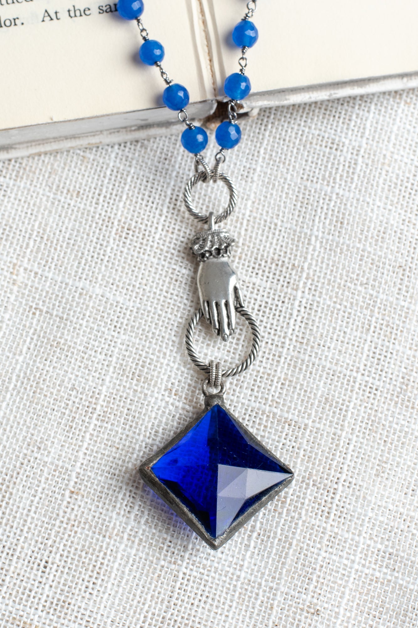 Cobalt Blue Soldered Crystal Pendant with Vintage Hand Drop on Cobalt Blue Quartz and Gunmetal Silver Rosary Chain Necklace
