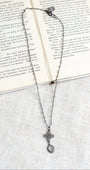 Pave Crystal Knot Cross and Drop Pendant in Gunmetal on Delicate Labradorite Rosary Bead Chain Necklace