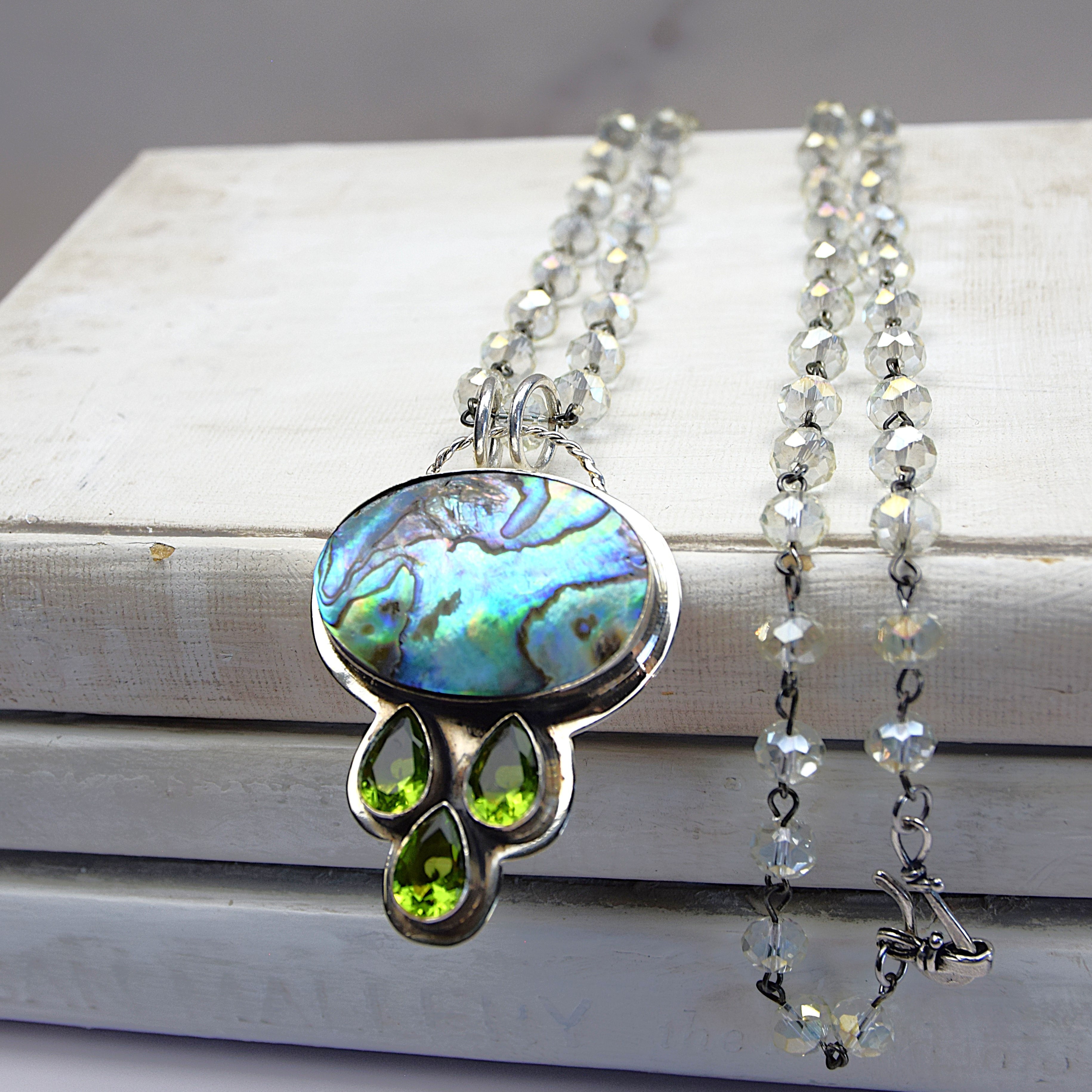 Sterling Silver Abalone Pendant with Peridot on a Clear Crysal Rosary Chain