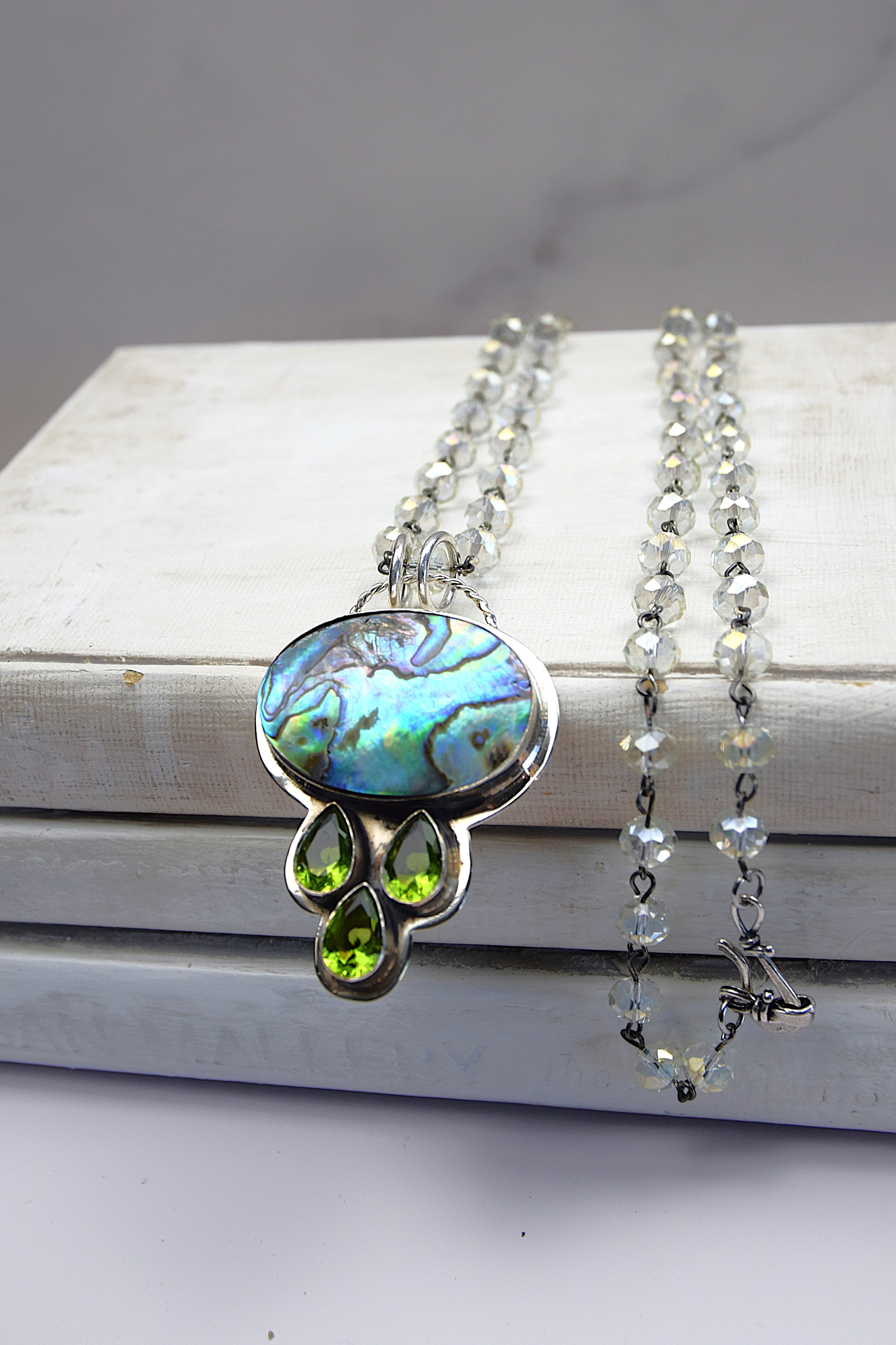 Sterling Silver Multicolor Abalone Pendant with 3 Tear Drop Peridot on a Clear Crysal Rosary Chain
