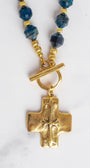 Gold Cross Pendant on a Blue Cat's Eye Stone Beaded Necklace