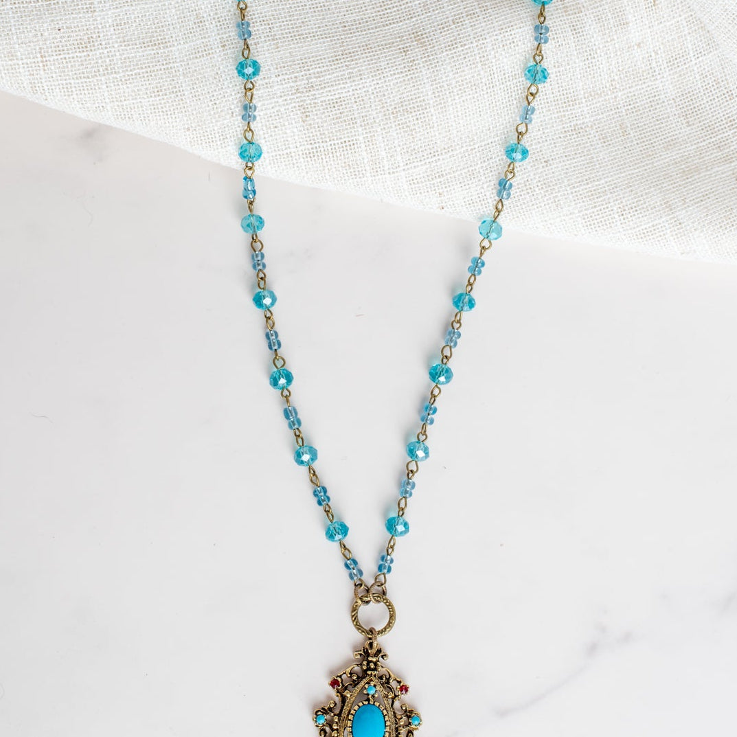 Vintage Dark Gold Designer Pendant with Red Rhinestones and Faux Turquoise on a Turquoise Crystal and Gold Rosary Chain Necklace