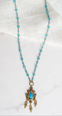 Vintage Dark Gold Designer Pendant with Red Rhinestones and Faux Turquoise on a Turquoise Crystal and Gold Rosary Chain Necklace