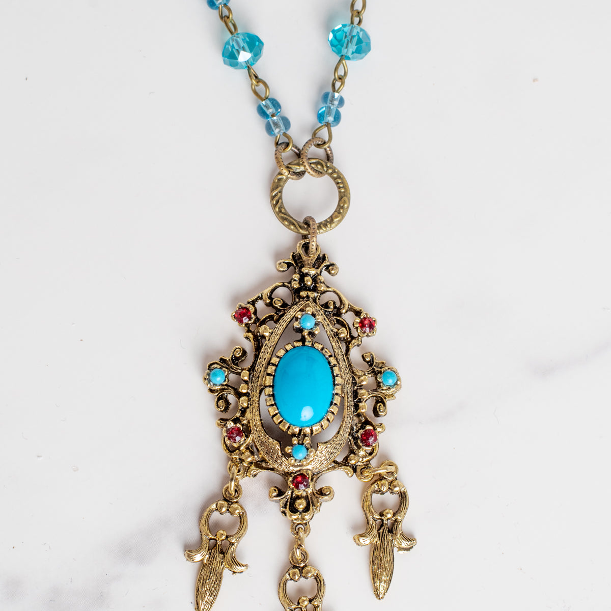 Vintage Dark Gold Designer Pendant with Red Rhinestones and Faux Turquoise on a Turquoise Crystal and Gold Rosary Chain Necklace