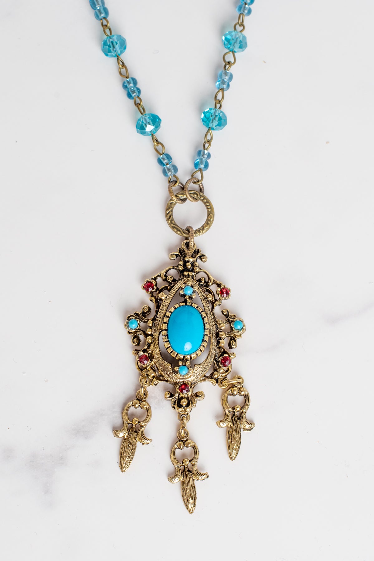 Vintage Dark Gold Designer Pendant with Red Rhinestones and Faux Turquoise on a Turquoise Crystal and Gold Rosary Chain Necklace