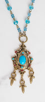 Vintage Dark Gold Designer Pendant with Red Rhinestones and Faux Turquoise on a Turquoise Crystal and Gold Rosary Chain Necklace