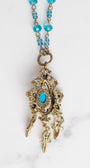 Vintage Dark Gold Designer Pendant with Red Rhinestones and Faux Turquoise on a Turquoise Crystal and Gold Rosary Chain Necklace