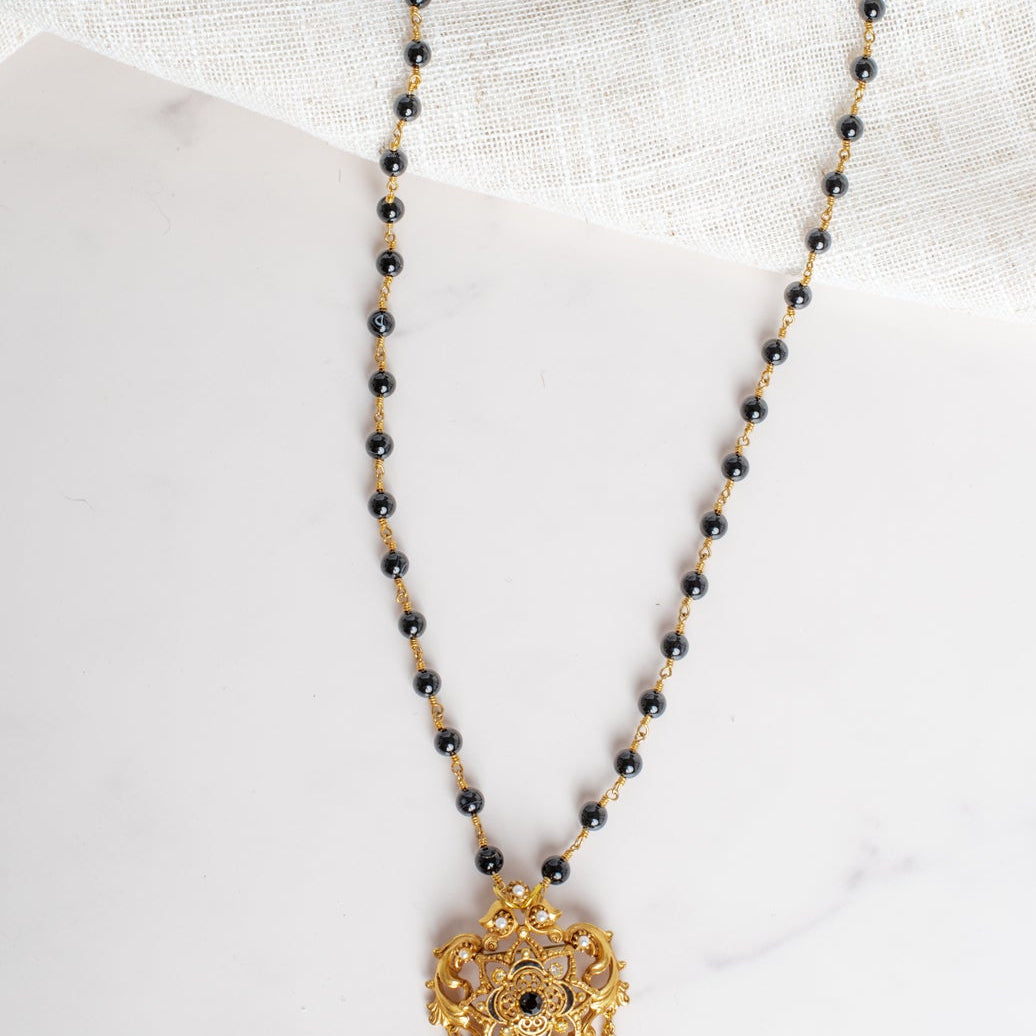 Vintage Gold Plated Florenza Collectible Brooch Pendant with Black Rhinestones, Faux Pearls, Black Enamel and Chain Draping on a Black Stone Rosary Chain Necklace