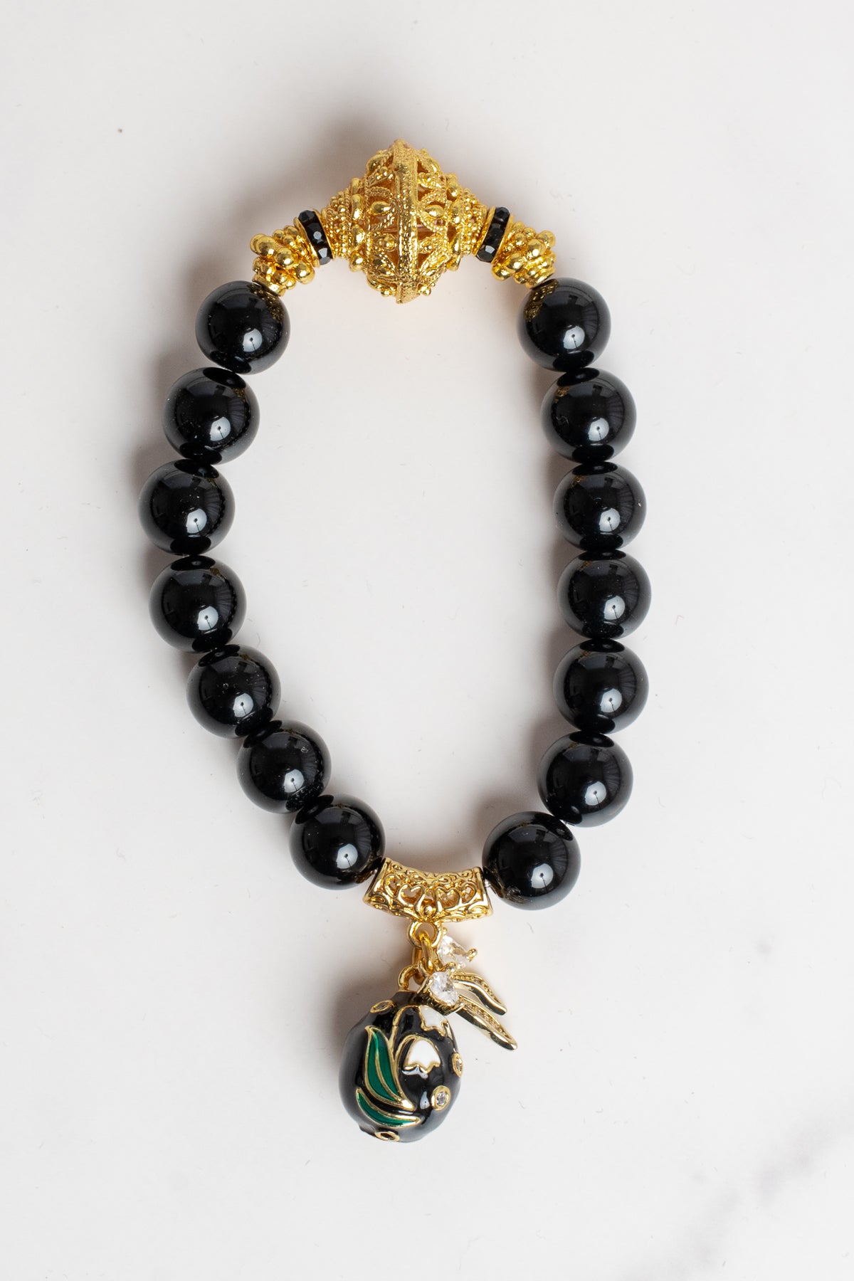 Black Onyx and Gold Bead Stretch Bracelet with Cloisonne Egg and Crystal Bow