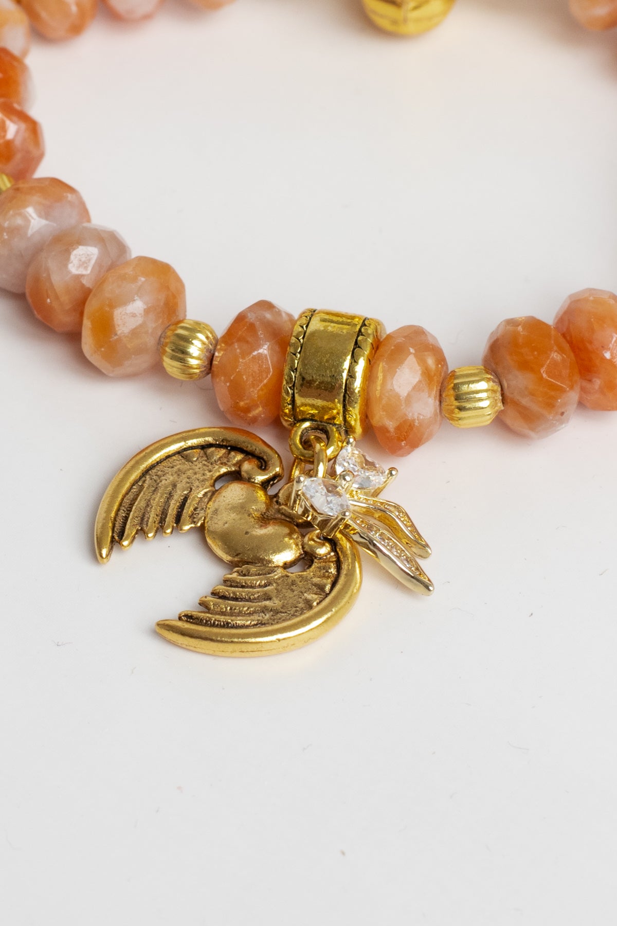 Gold Italian Style Focal Beads on a Stretch Bracelet of Orange White Agate with Wings and Heart Charm