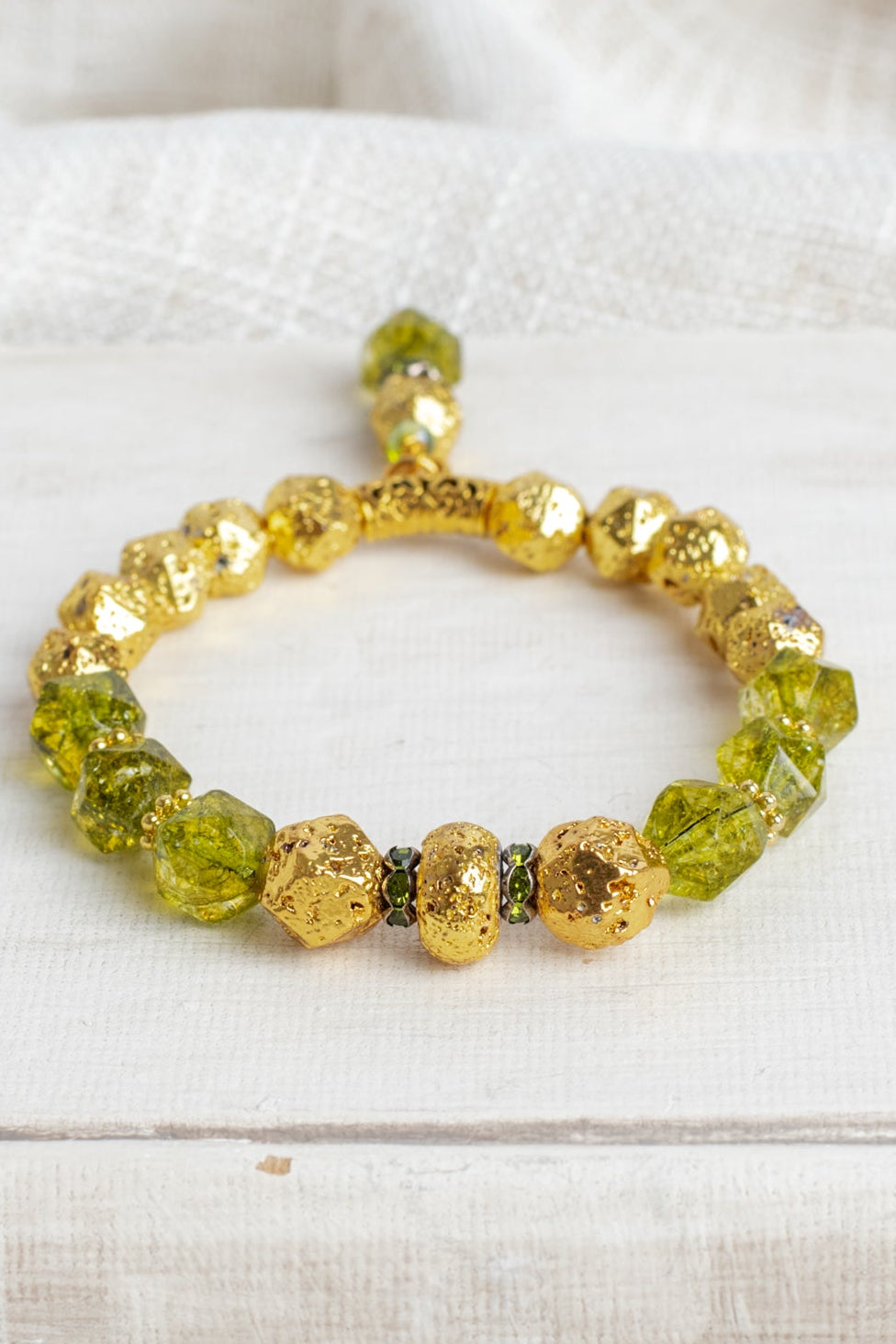 Peridot Green Crystal Stone Stretch Bracelet with Gold Plated Beads and Drop Charm