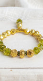 Peridot Green Crystal Stone Stretch Bracelet with Gold Plated Beads and Drop Charm