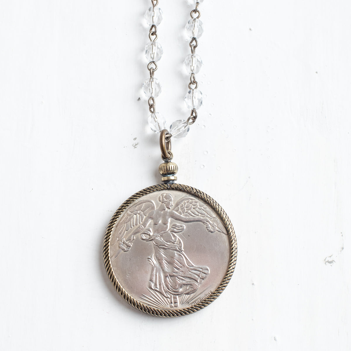Antique Silver Dollar Coin Replica Pendant on a Bronze and Crystal Rosary Chain