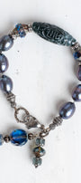 Peacock Pearl Bracelet with Carved Stone Focal and Czech Crystal Beads and Charms