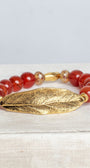 Gold Large Leave Wrist Charm on a Stretch Bracelet of Carnelian Stone Beads