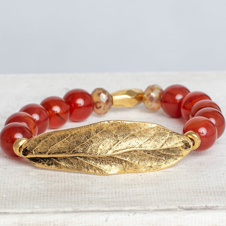 Gold Large Leave Wrist Charm on a Stretch Bracelet of Carnelian Stone Beads