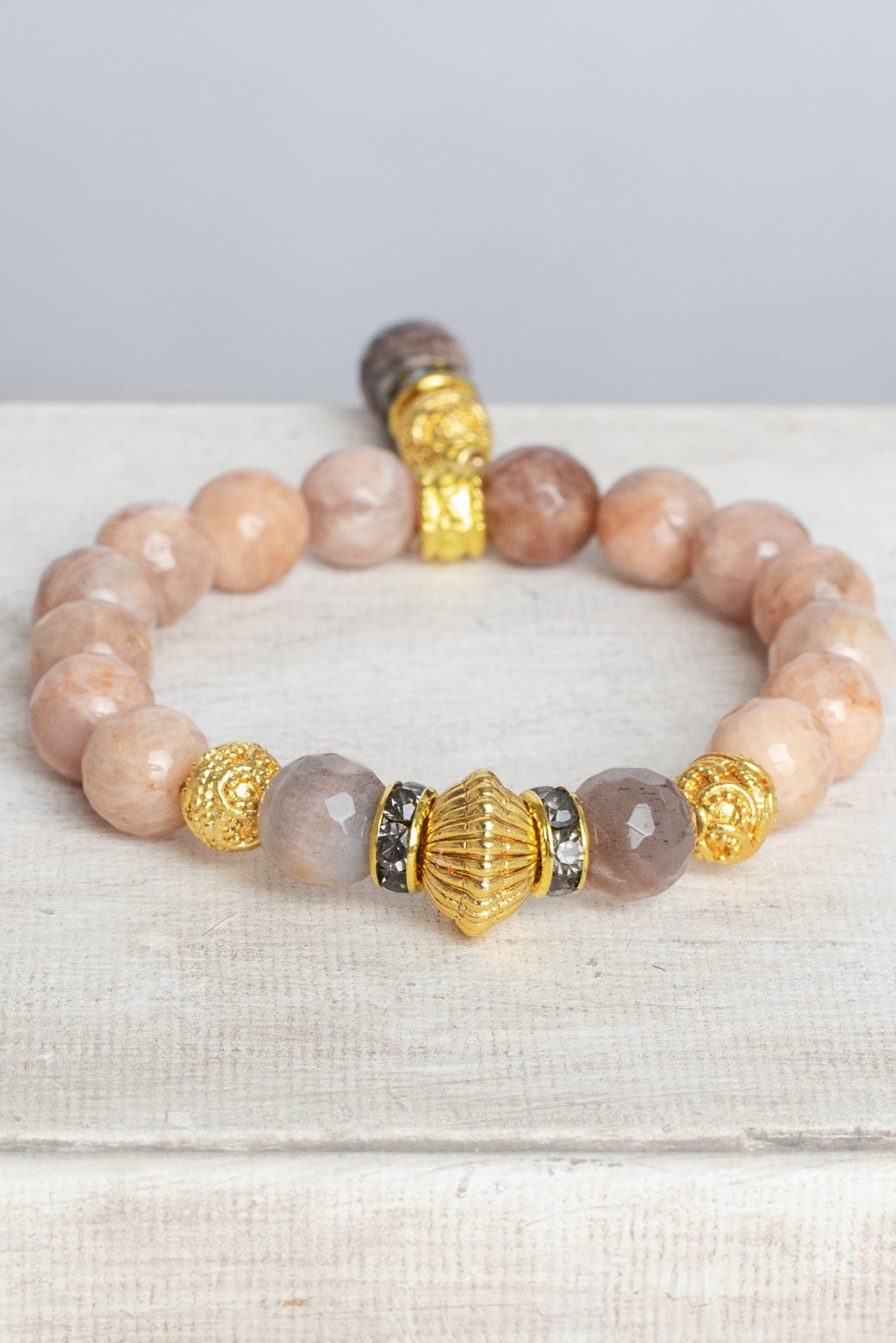 Gold Italian Style Beads and Stone Charm on a Stretch Bracelet of Faceted Peach Moonstone