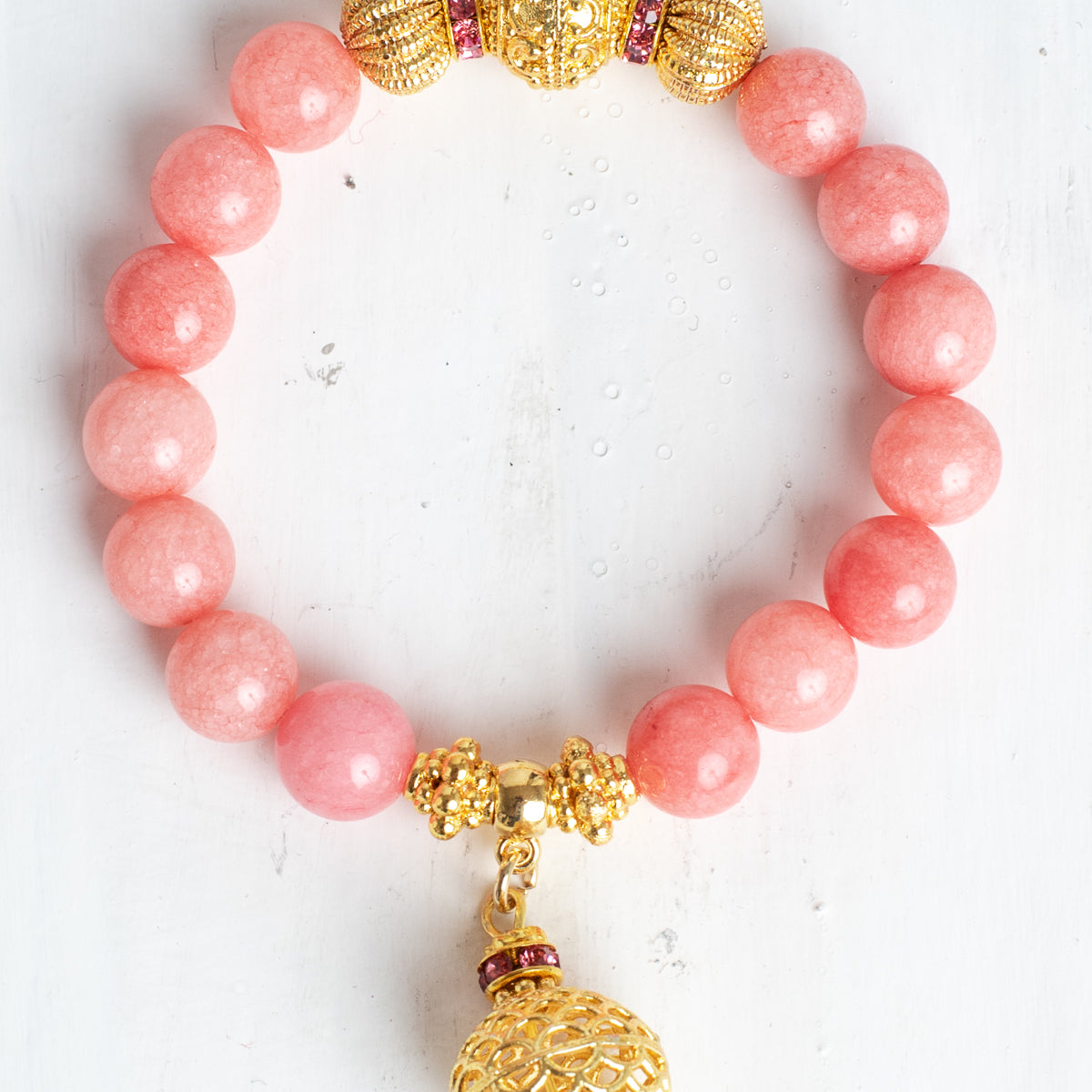 Gold Italian Style Focal Beads and Filigree Charm on a Stretch Bracelet of Pink Peach Quartz