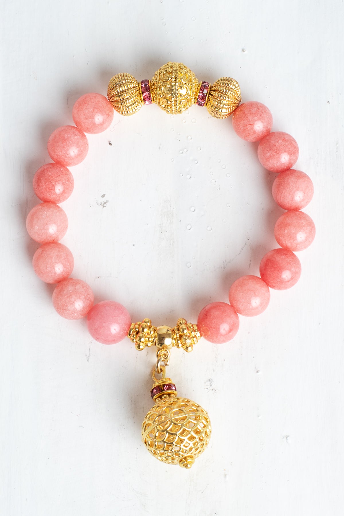 Gold Italian Style Focal Beads and Filigree Charm on a Stretch Bracelet of Pink Peach Quartz