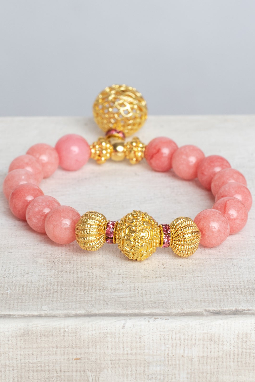 Gold Italian Style Focal Beads and Filigree Charm on a Stretch Bracelet of Pink Peach Quartz
