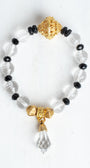 Crystal Quartz Faceted Beads with Gold Filigree Focal on a Stretch Bracelet with a Crystal Drop Charm