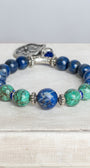 Blue Sodalite and Green Turquoise Stone Bead Stretch Bracelet with Silver Fleur de Lis Shield Charm