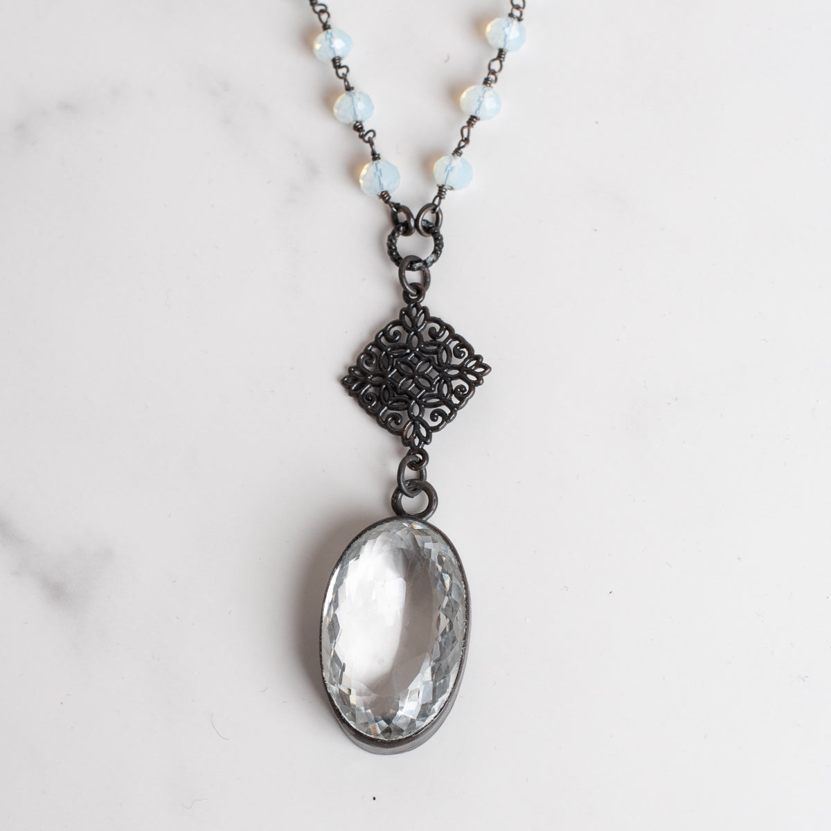 White Topaz Oval Pendant on an Opalite and Bronze Rosary Chain Necklace