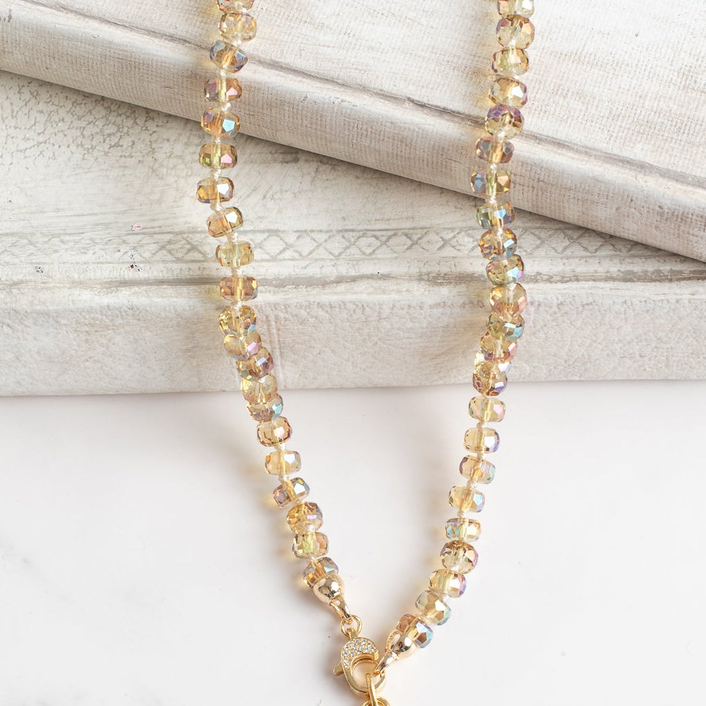 Floral Gold Plated Pendant with White Crystal on a Gold Crystal Necklace