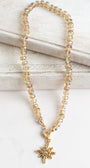 Floral Gold Plated Pendant with White Crystal on a Gold Crystal Necklace