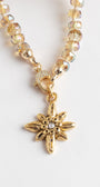 Floral Gold Plated Pendant with White Crystal on a Gold Crystal Necklace