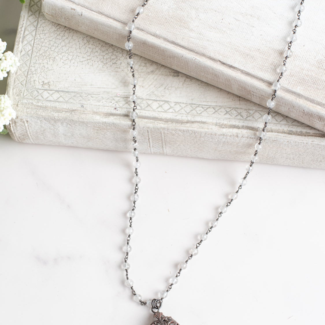 Soldered Fancy Chandelier Crystal Pendant with Cross on a Moonstone and Gunmetal Rosary Chain Necklace