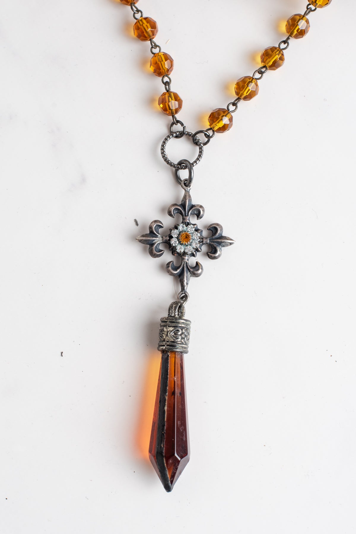 Hand Soldered Golden Topaz Crystal on a Crystal and Gunmetal Rosary Chain and Fleur de Lis Cross Necklace