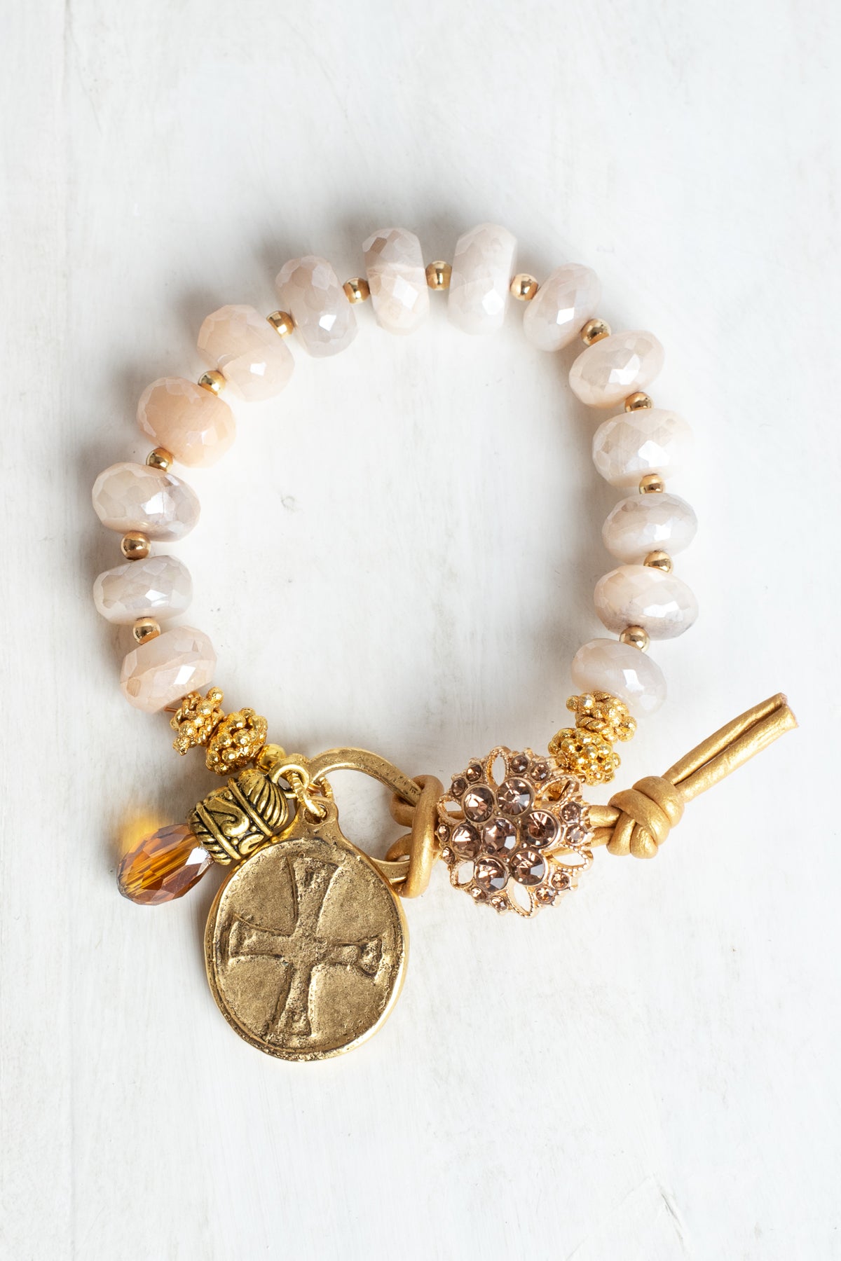Coated Sapphire Bracelet with Angel Cross Gold Charm, Button and Leather Closure and Crystal