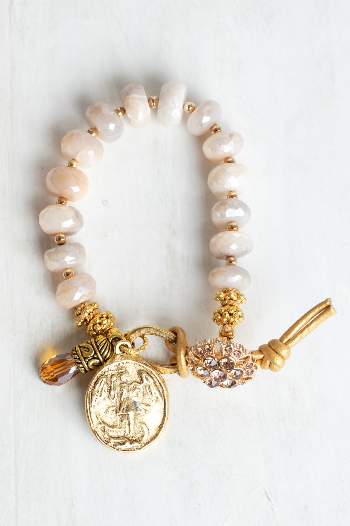 Coated Sapphire Bracelet with Angel Cross Gold Charm, Button and Leather Closure and Crystal