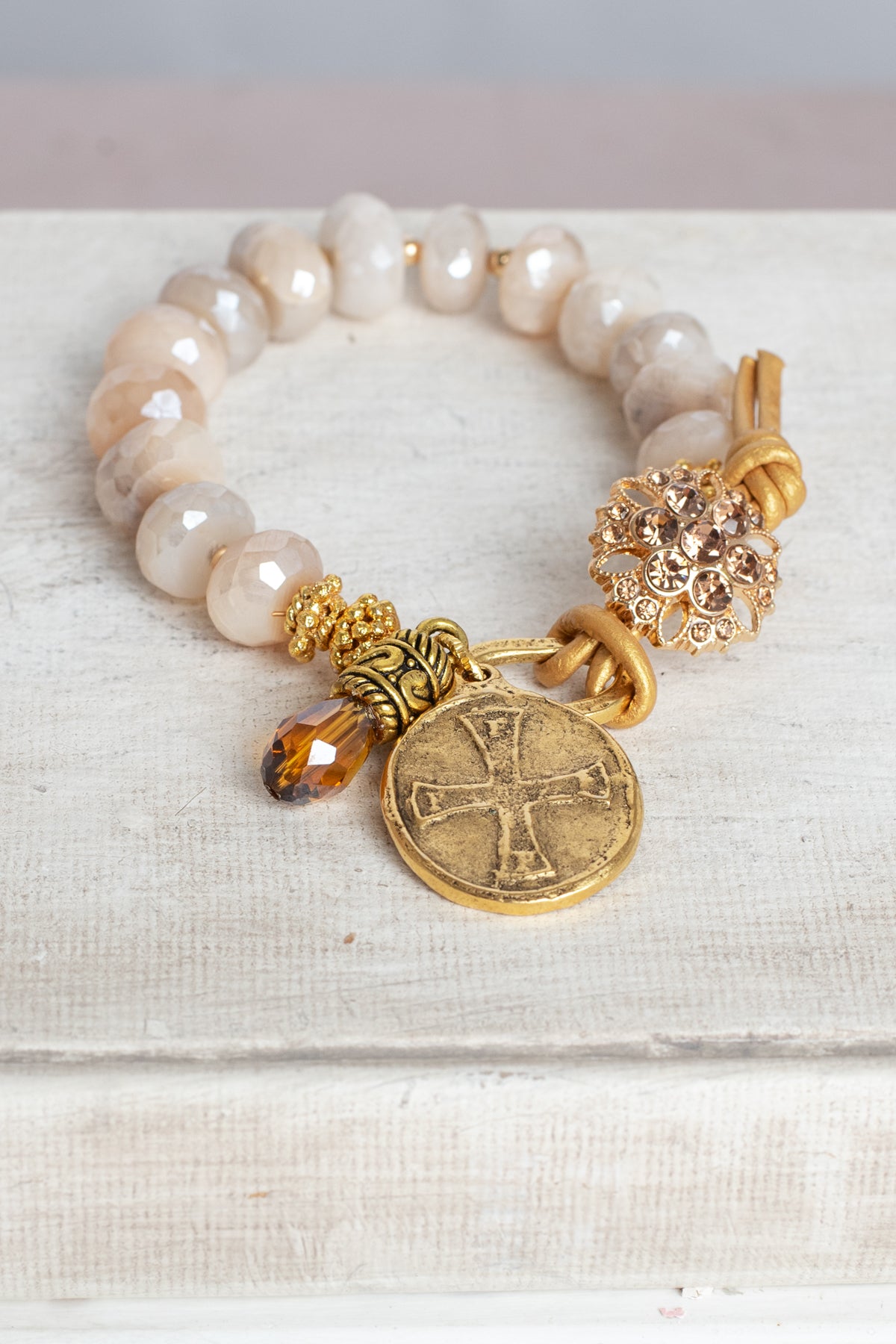 Coated Sapphire Bracelet with Angel Cross Gold Charm, Button and Leather Closure and Crystal