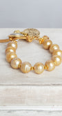 Gold Freshwater Pearl Bracelet with Angel Cross Gold Charm, Button and Leather Closure and Crystal