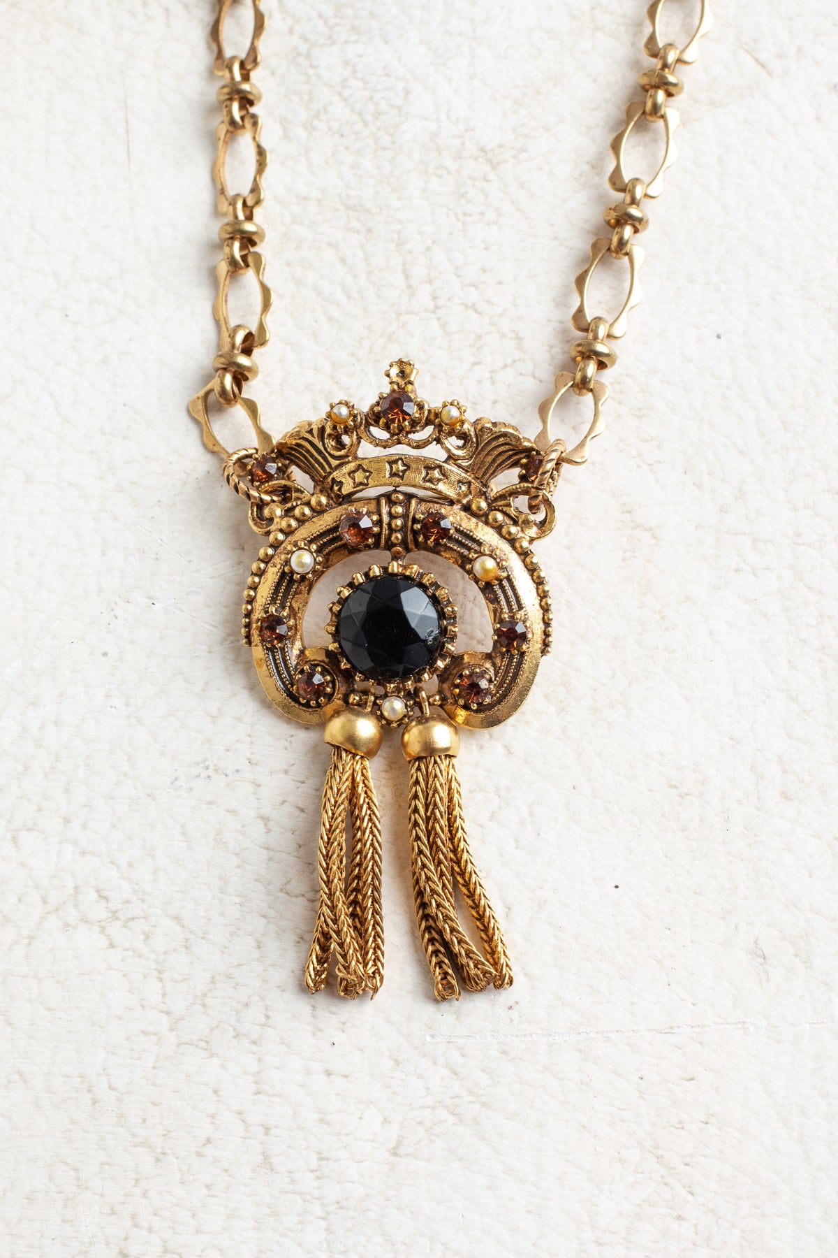 Vintage Gold Signed "Florenza" Designer Crown Brooch Pendant with Black and Brown Rhinestones, Faux Pearl Accents and Chain Tasels on a Designer Gold Tone Chain Necklace
