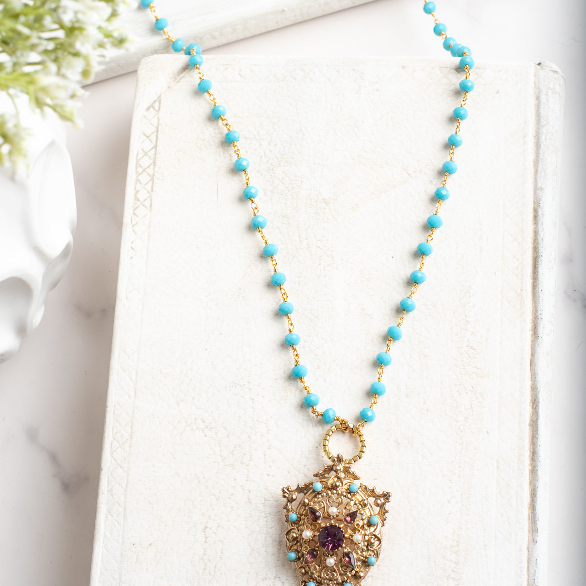Vintage Gold Designer Brooch Pendant with Purple Rhinestones, Turquoise and Pearl Accents on a Turquoise and Gold Rosary Chain Necklace