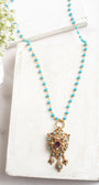 Vintage Gold Designer Brooch Pendant with Purple Rhinestones, Turquoise and Pearl Accents on a Turquoise and Gold Rosary Chain Necklace