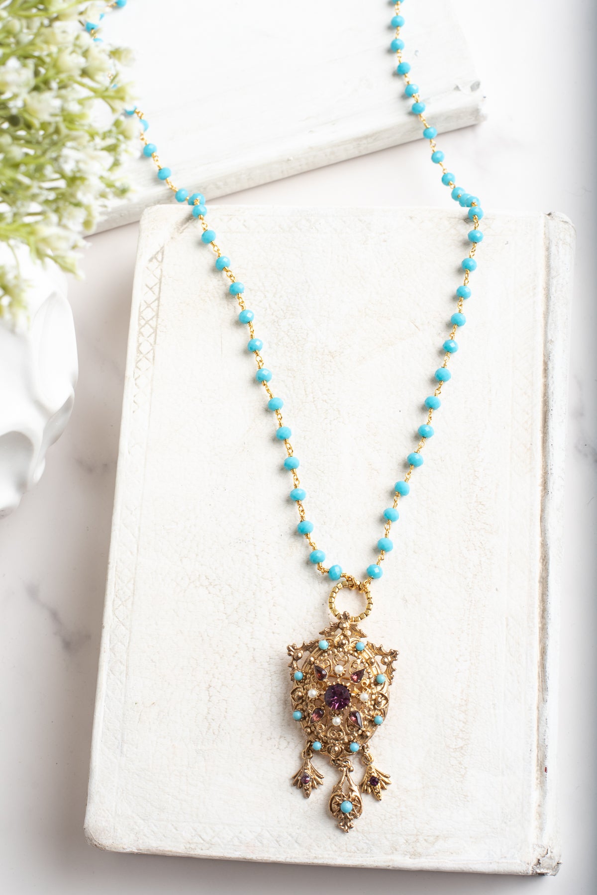 Vintage Gold Designer Brooch Pendant with Purple Rhinestones, Turquoise and Pearl Accents on a Turquoise and Gold Rosary Chain Necklace
