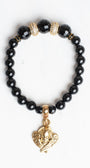 Gold Plated Angel Charm on a black Agate Stone Stretch Bracelet with Micro Pave Focal Beads