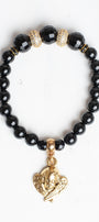 Gold Plated Angel Charm on a black Agate Stone Stretch Bracelet with Micro Pave Focal Beads