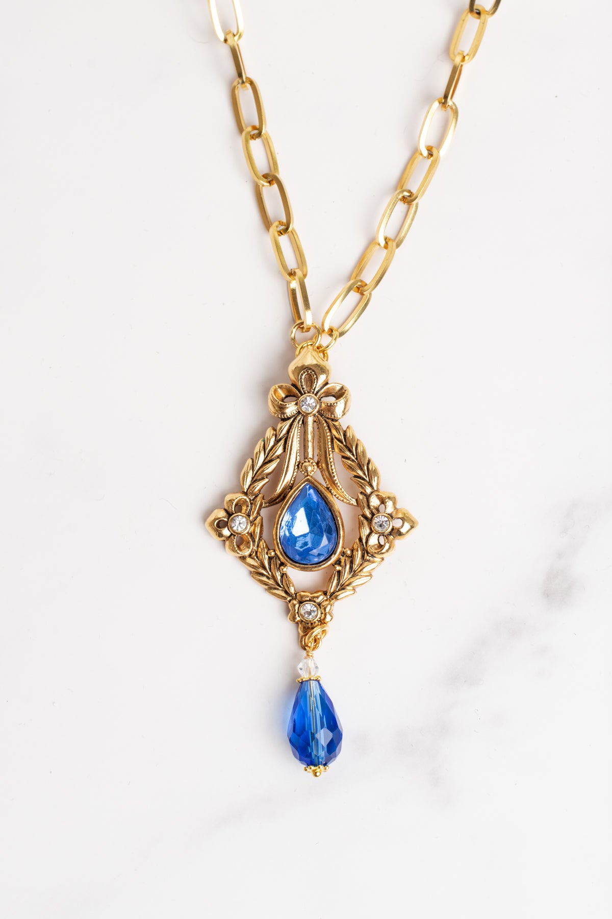 Vintage AVON Pendant with Royal Blue and White Rhinestones on a Gold Plated Paperclip Chain Necklace