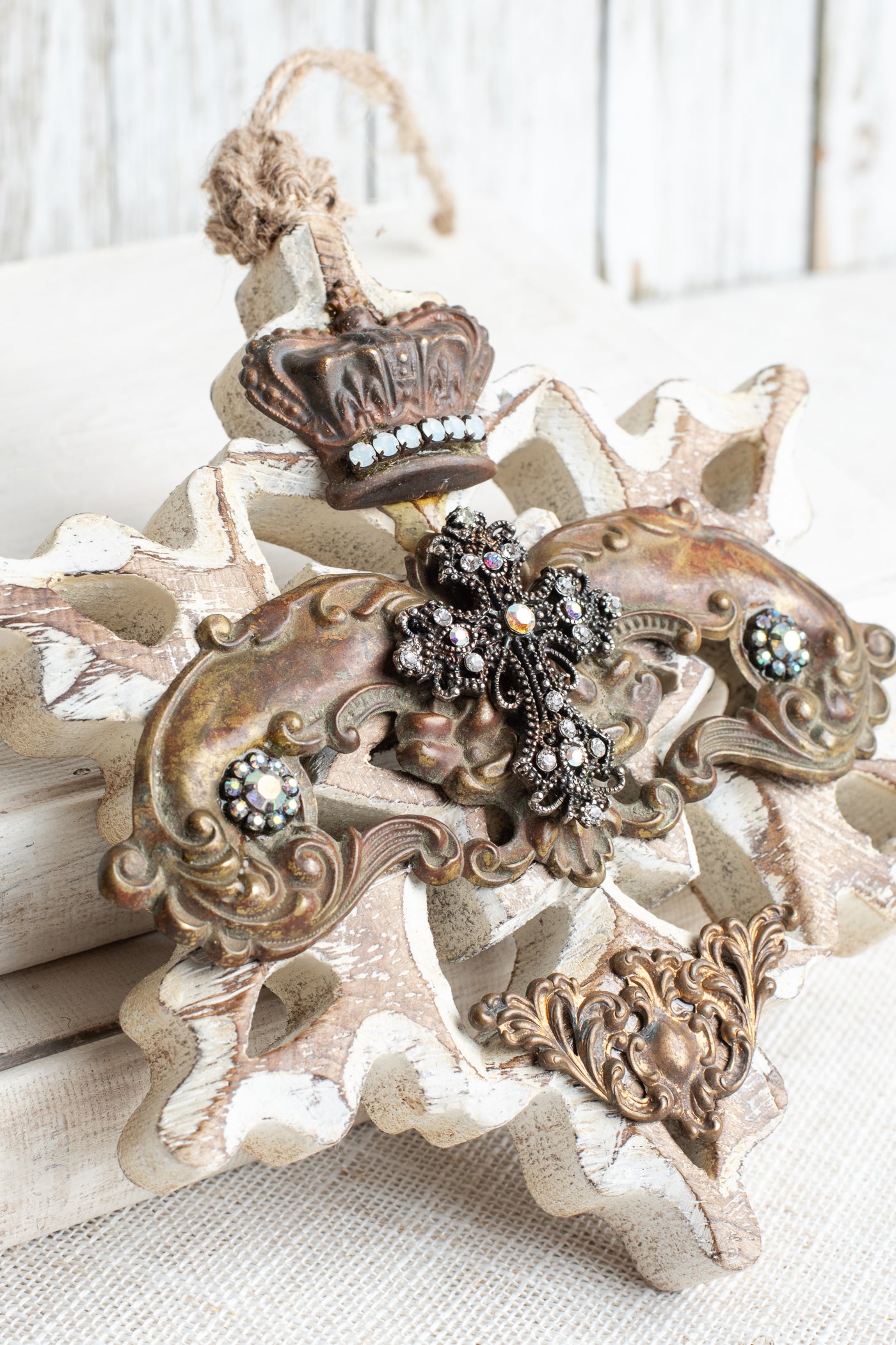 White Washed Wood Decor Ornament with Crown, Cross, Rhinestone, and Brass Embellishments Ornament