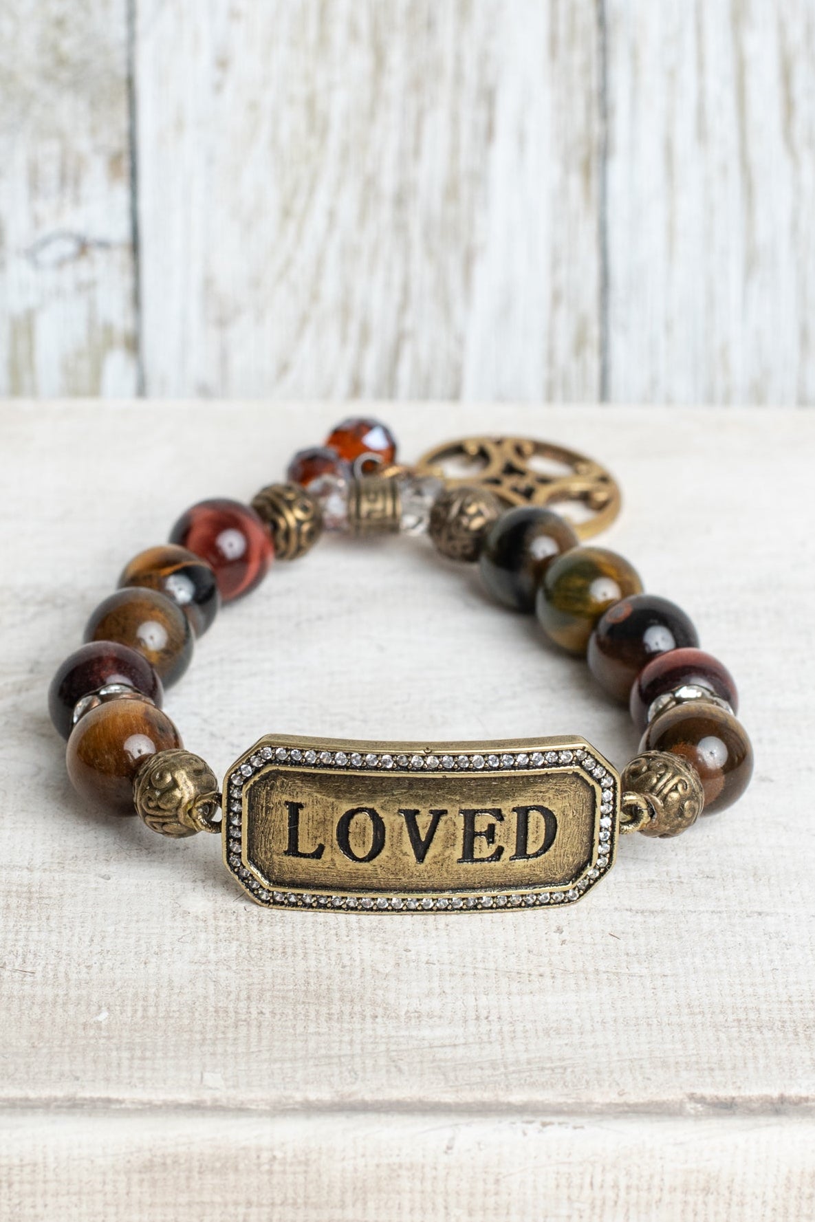Vintage Style "LOVED" Metal Wrist Plate with Crystal Stones on a Tiger's Eye Stone Stretch Bracelet with Open Cross Style Charm