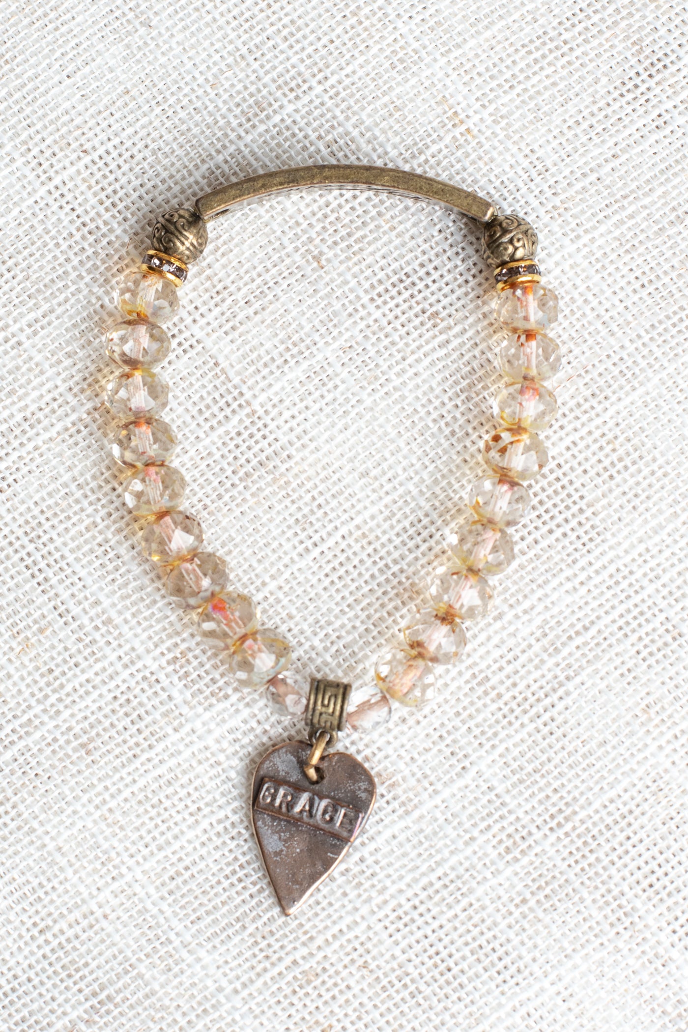 Bronze Center with Family/Forever Inscribed on Antiqued Czech Clear and Brown Crystal Stretch Bracelet with Heart Charm GRACE