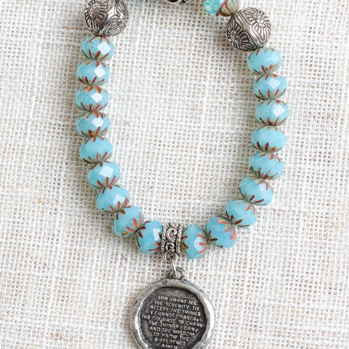 Aqua Rhondelle Beaded Stretch Bracelet with Silver Plated Focal Beads and Silver Plated Serenity Prayer Charm