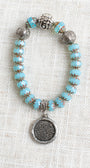 Aqua Rhondelle Beaded Stretch Bracelet with Silver Plated Focal Beads and Silver Plated Serenity Prayer Charm