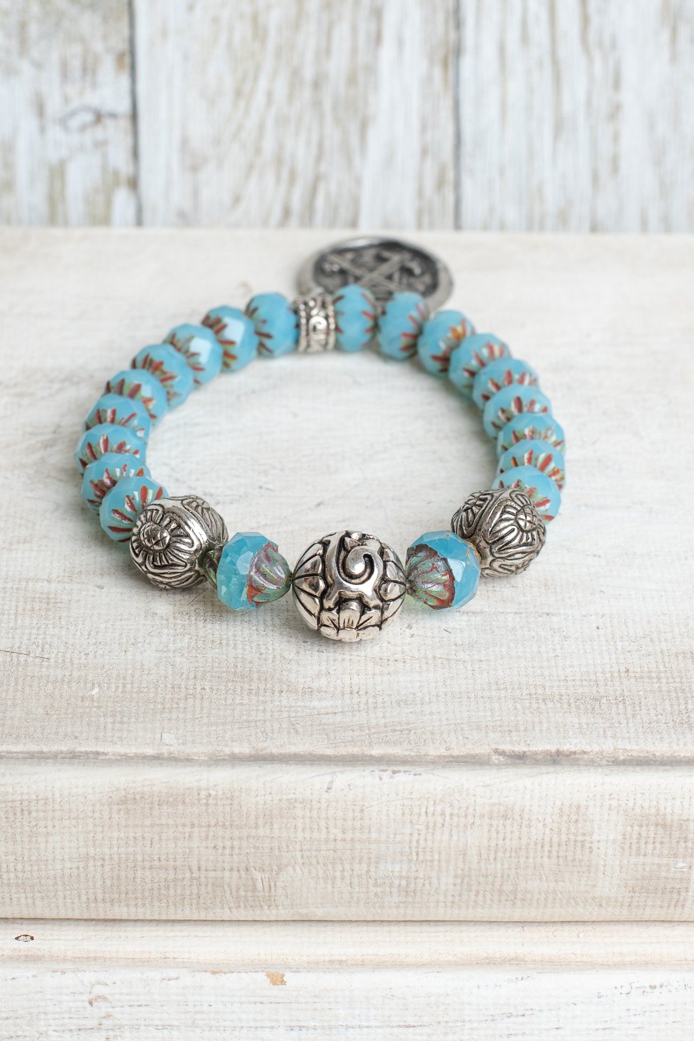 Aqua Rhondelle Beaded Stretch Bracelet with Silver Plated Focal Beads and Silver Plated Serenity Prayer Charm